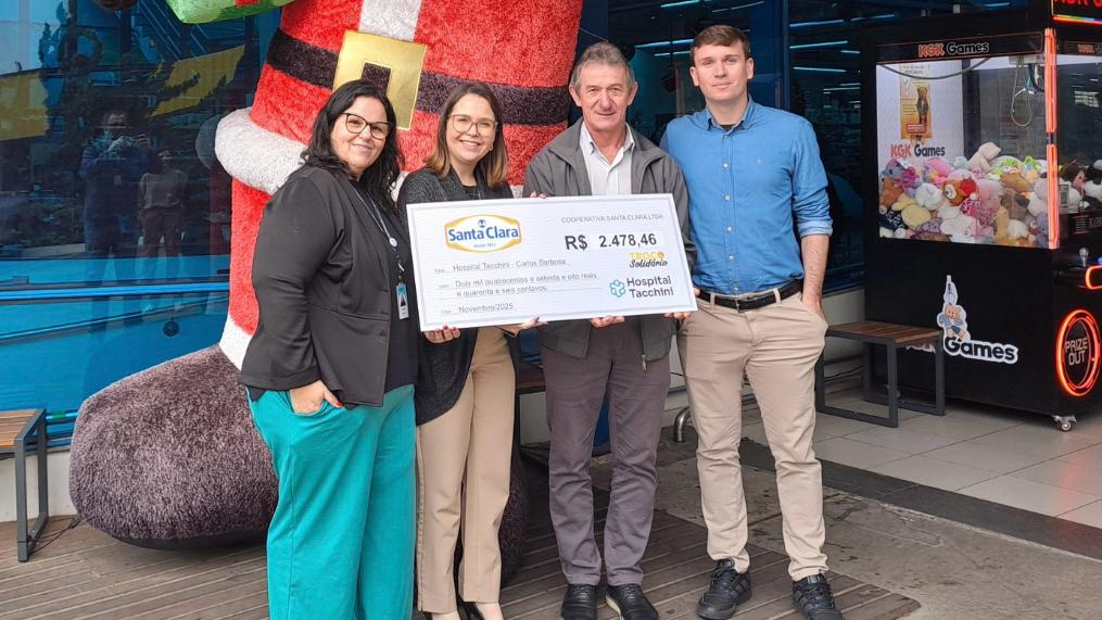 Tacchini Carlos Barbosa recebe doação do projeto Troco Solidário da Santa Clara.